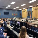 AT Caucus